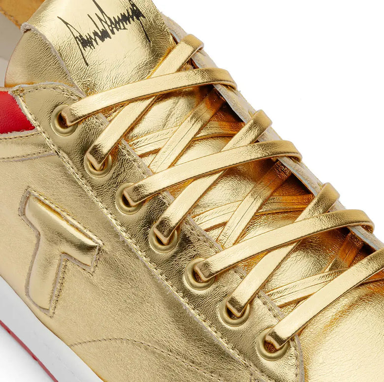 The Never Surrender Gold Low Top Sneakers